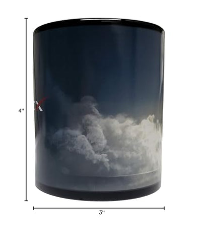 Mean Muggin taza negro con diseño espacial, ideal para fans de cohetes.