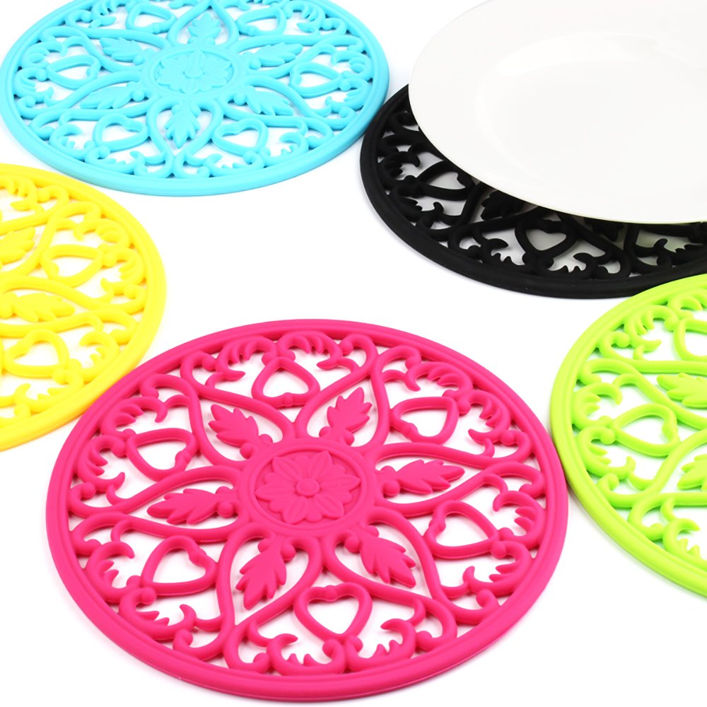 ME.FAN trivets silicona almacenamiento sencillo con orificio para colgar.