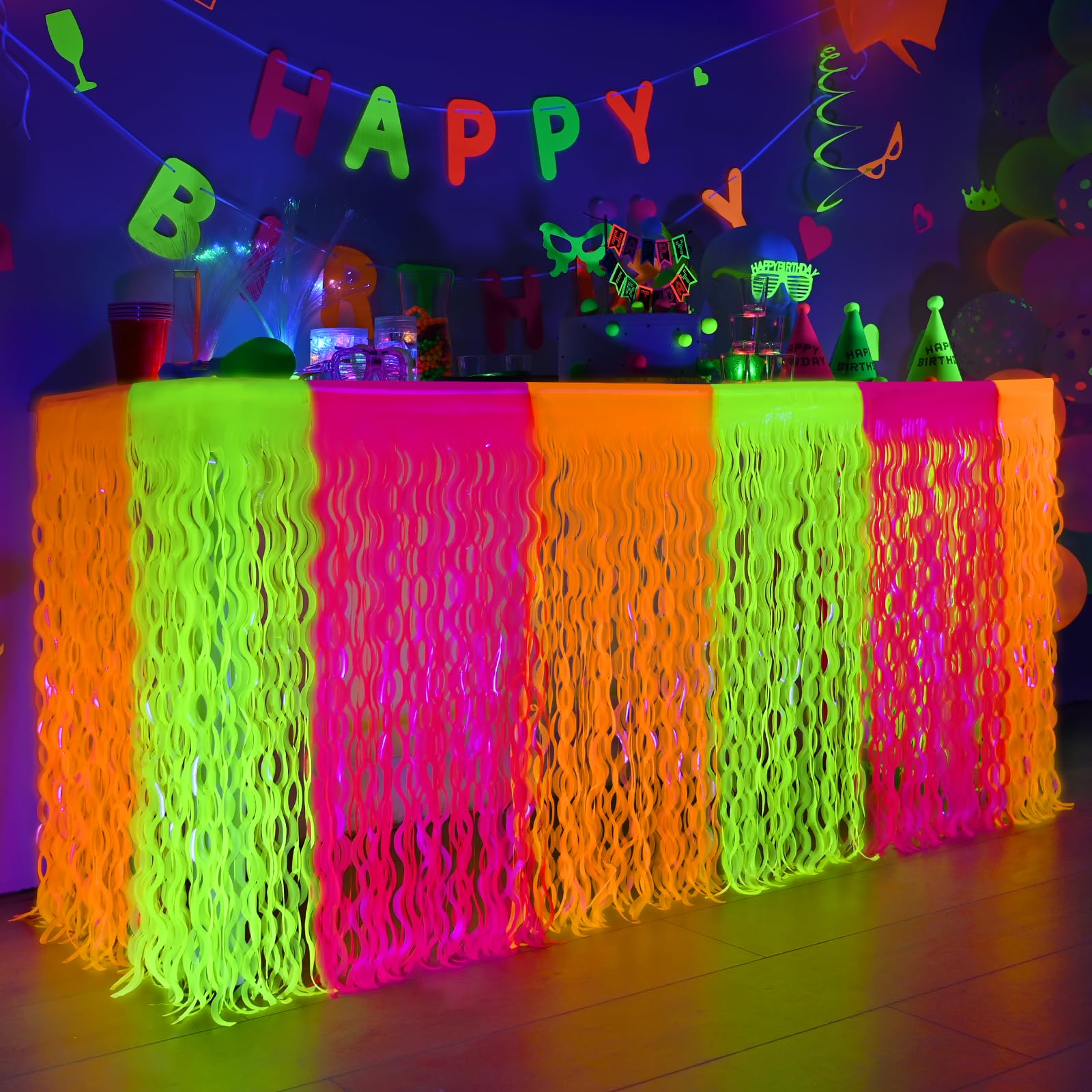 Falda de mesa Mega-L neon naranja brillando en la oscuridad para fiestas.