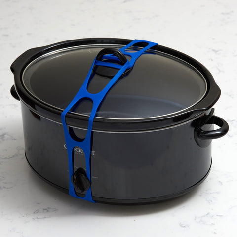 Mella Lid Latch, silicona alimentaria resistente al calor para uso en cocina.