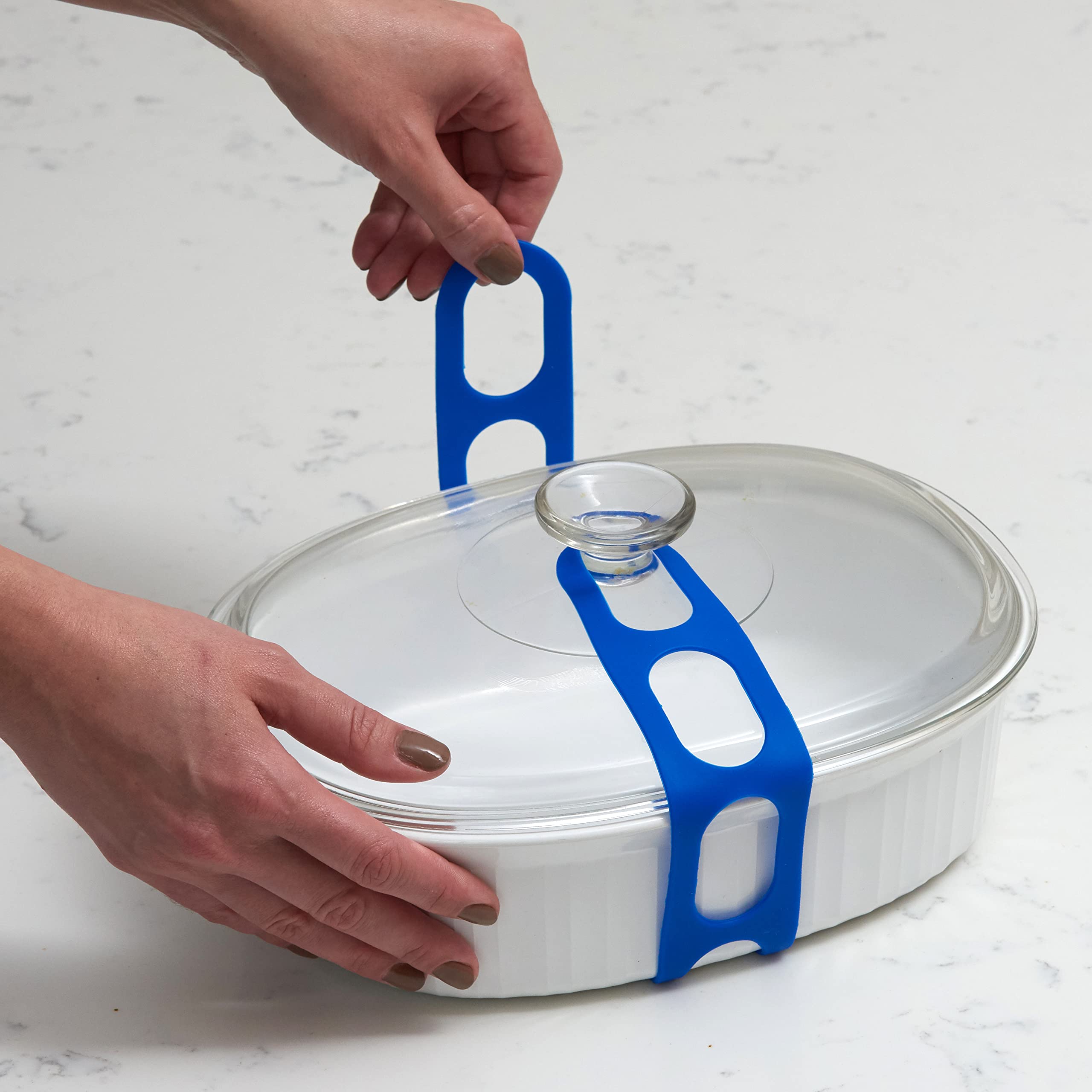 Mella Lid Latch, sistema de cierre simple para asegurar platos y ollas.