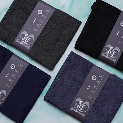 Delantal Mellow Buff en múltiples colores, versátil para cualquier cocina.