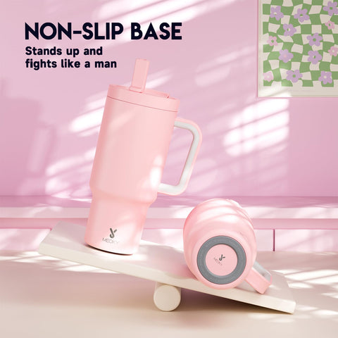 Meoky 32oz tumbler color rosa suave, diseño elegante y moderno.