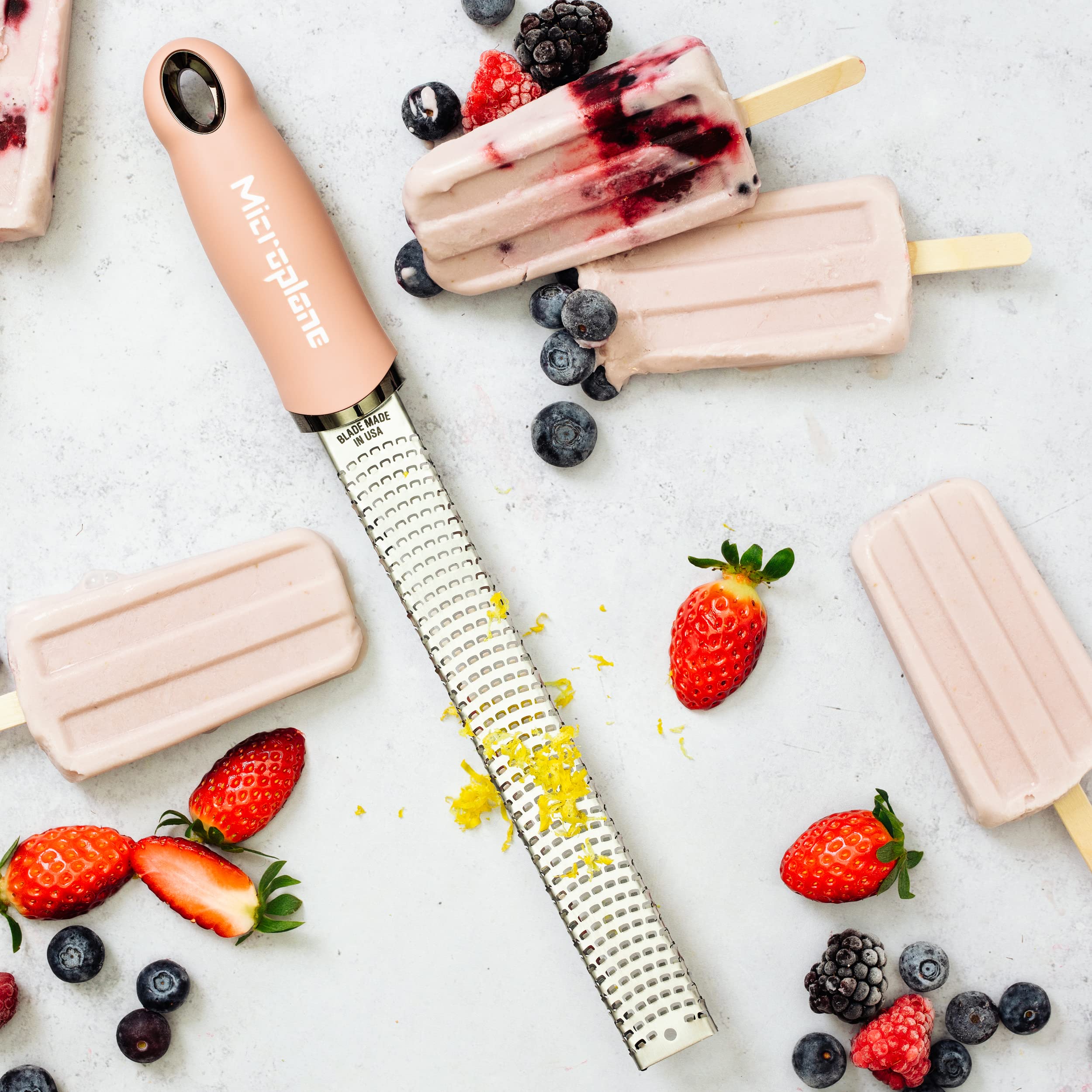Microplane rallador rosado ralla nuez moscada para especias aromáticas.