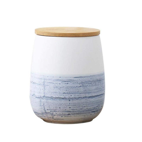 MilkyWay tarro cerámico blanco con tapa de madera, ideal para almacenar café.