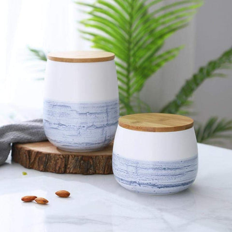 MilkyWay tarro cerámico blanco con tapa de madera, perfecto para té y especias.