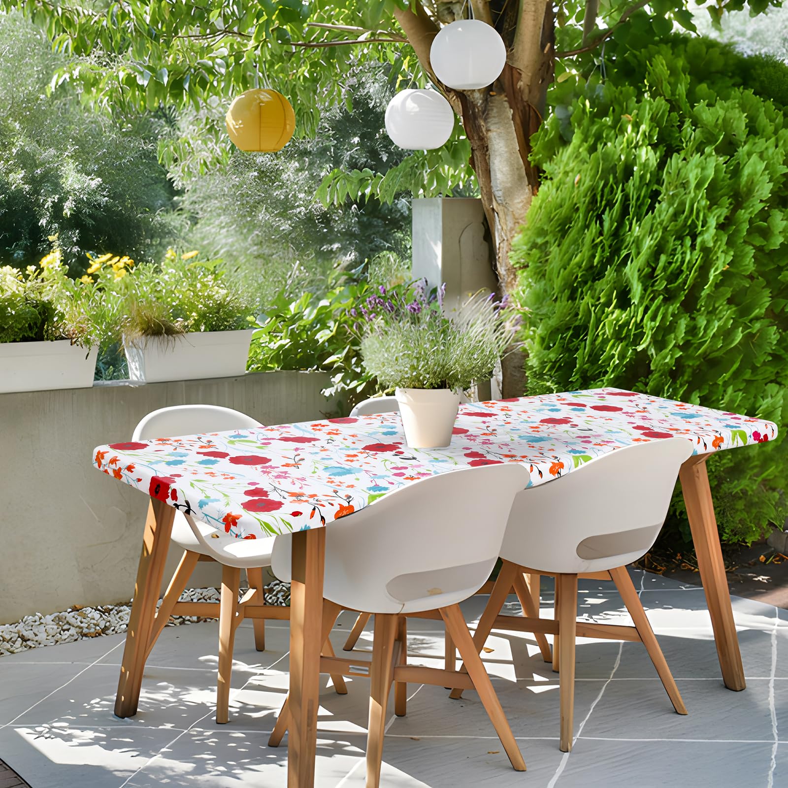 Uso interior y exterior con mantel Misaya para mesas plegables.