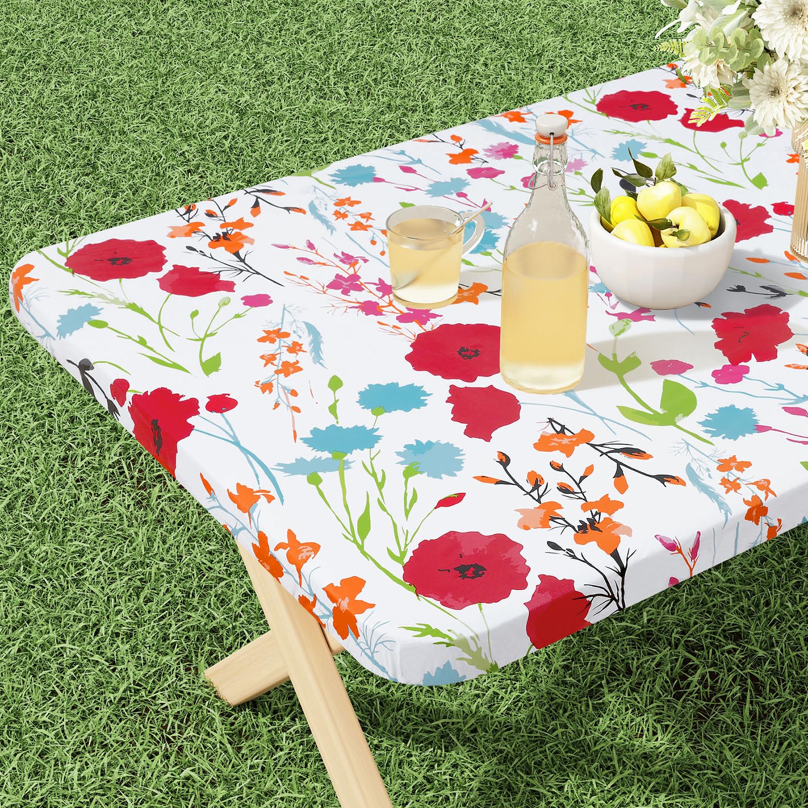 Mantel rectangular de vinilo Misaya con borde elástico para ajuste seguro.