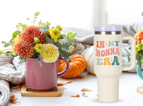 momocici Nonna vaso termico 40oz para coche, cabe en portavasos y es práctico.
