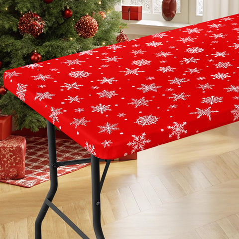 Moosfor mantel elástico con copos de nieve para mesa festiva.