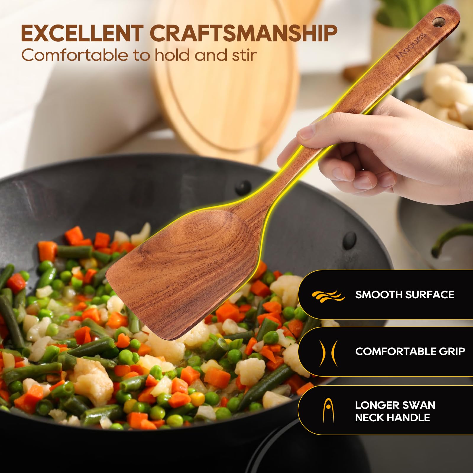 Utensilio Mooues teca resistente al calor para cocinar a altas temperaturas.