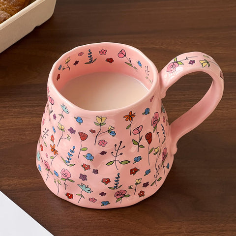 Movlen taza cerámica con diseño floral vivo en mesa