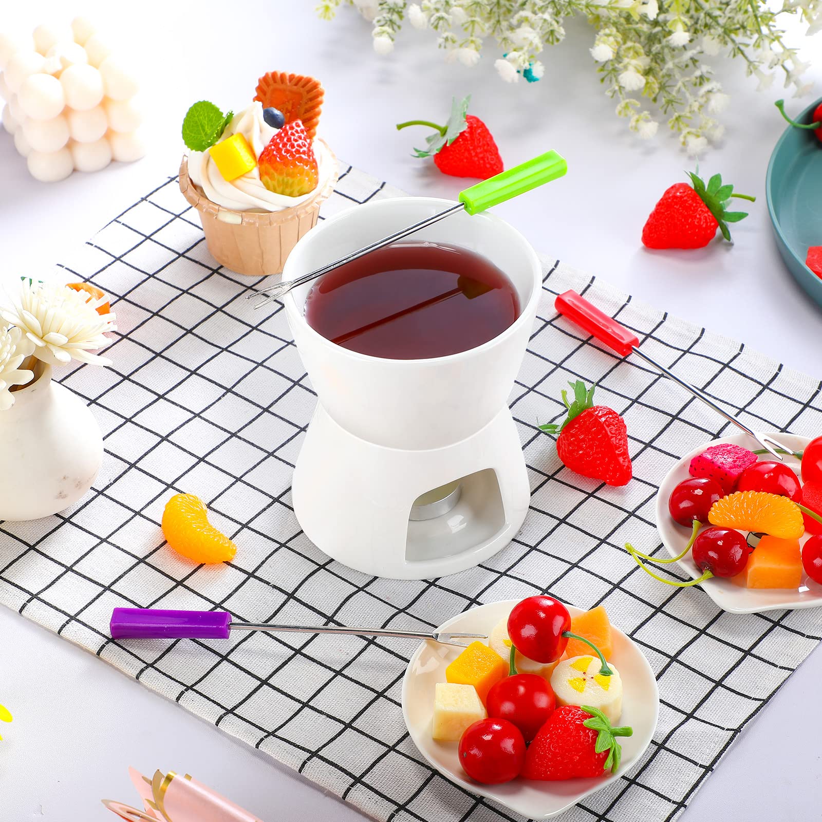 Mudder uso diferentes alimentos fondue, chocolate, queso, caldo y tapas.