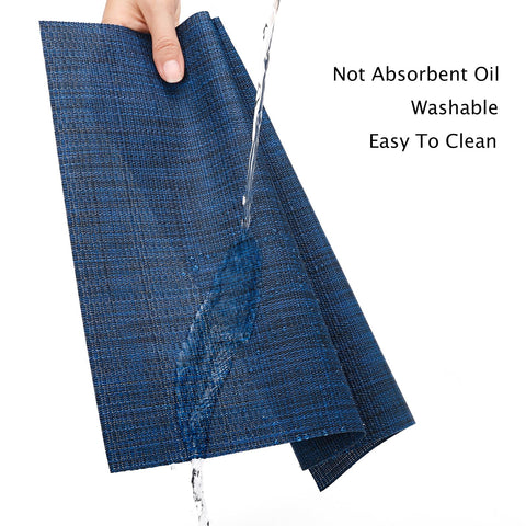 Manteles Myir JUN antideslizantes, azul oscuro, ideales para comidas ordenadas.