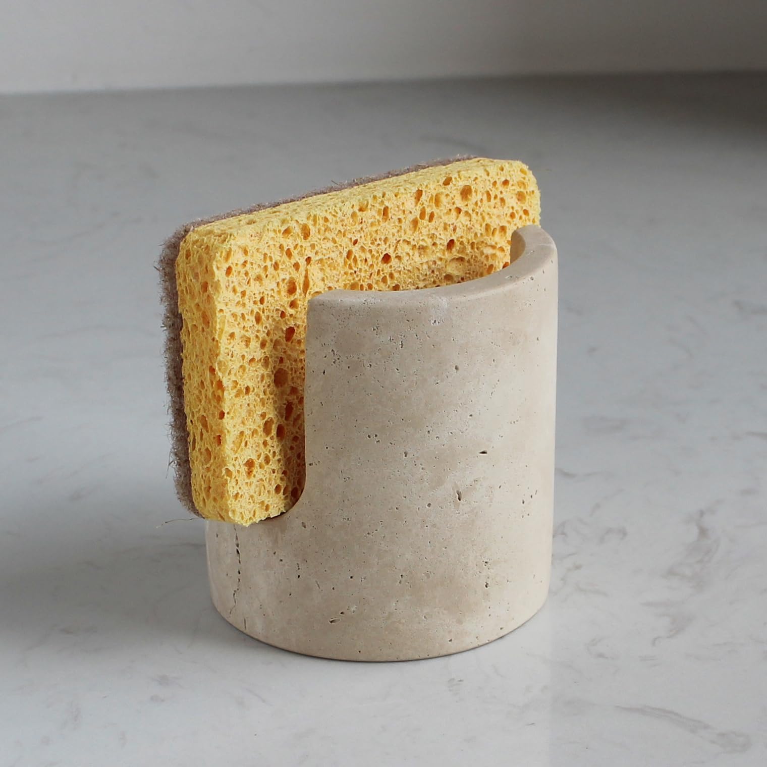 Natust portaesponjas de travertino natural, mantiene la esponja seca en la encimera.