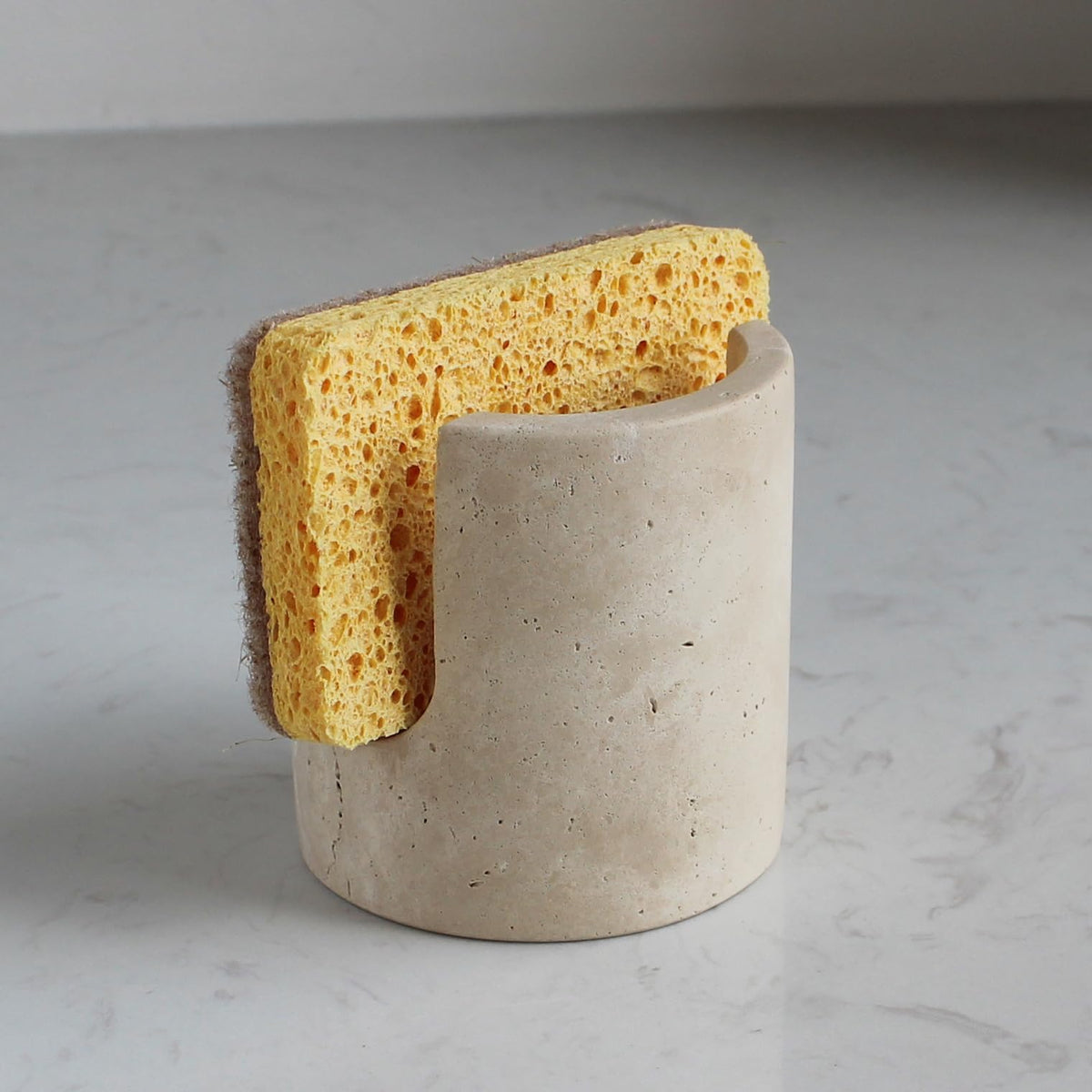 Natust portaesponjas de travertino natural, mantiene la esponja seca en la encimera.