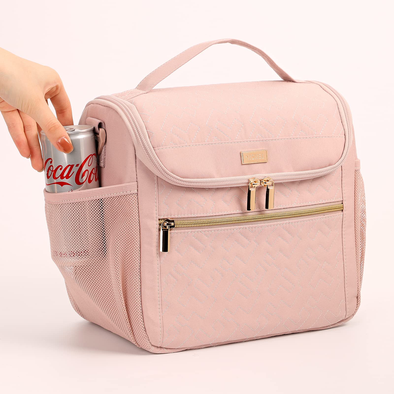 NISHEL bolsa con dos formas de cargar: asa y correa para el hombro.