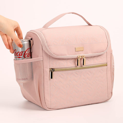 NISHEL bolsa con dos formas de cargar: asa y correa para el hombro.