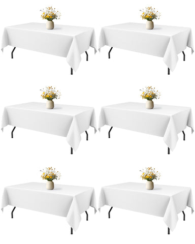 Mantel Niuara blanco rectangular 60x84 para mesas de 5 pies, caída elegante.