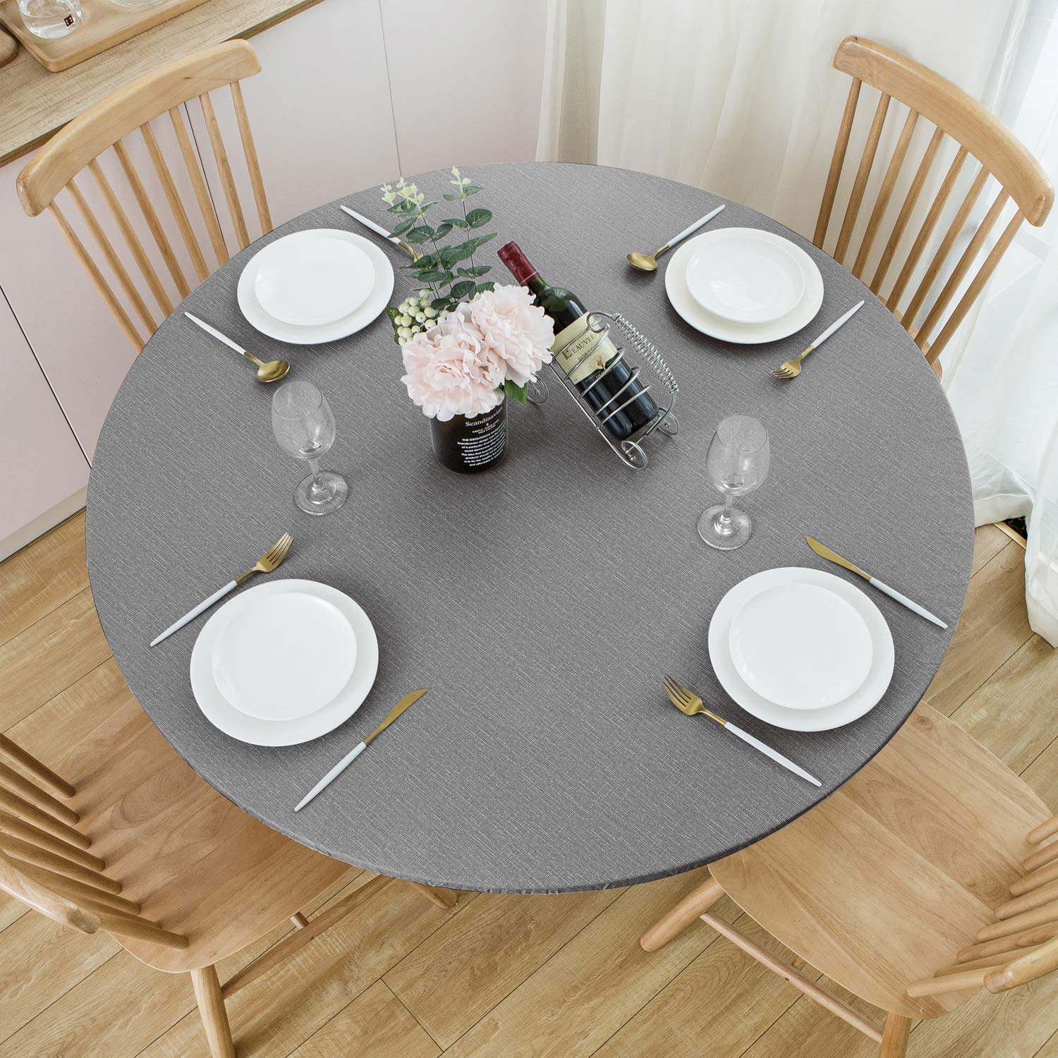 Mantel vinilo redondo NLMUVW con borde elástico gris para ajuste perfecto.