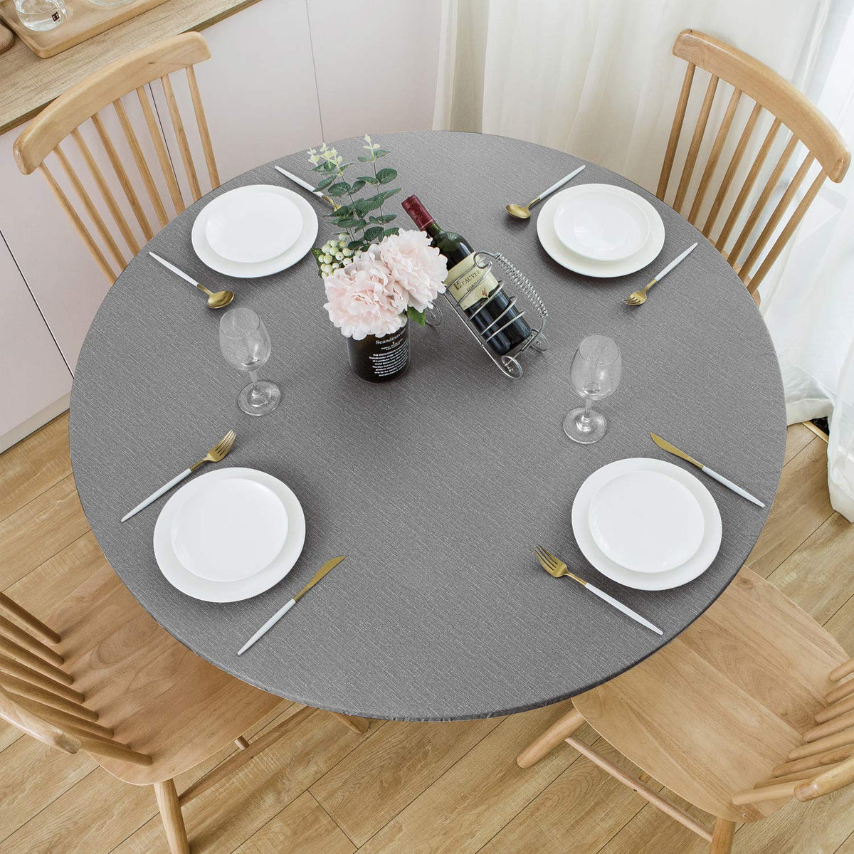 Mantel vinilo redondo NLMUVW con borde elástico gris para ajuste perfecto.