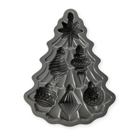 Nordic Ware capacidad 2 tazas, hornea seis cakelets con forma de árbol.
