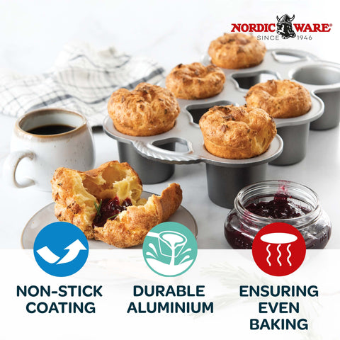 Nordic Ware Grand Popover Pan con ventilacion central para cocción pareja.