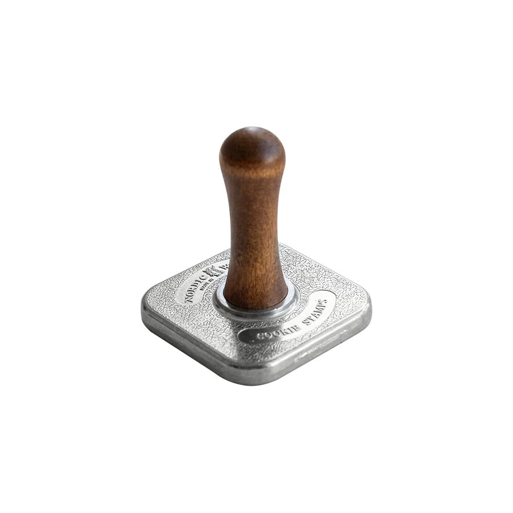 Nordic Ware hecho en Estados Unidos, mango de madera seguro.