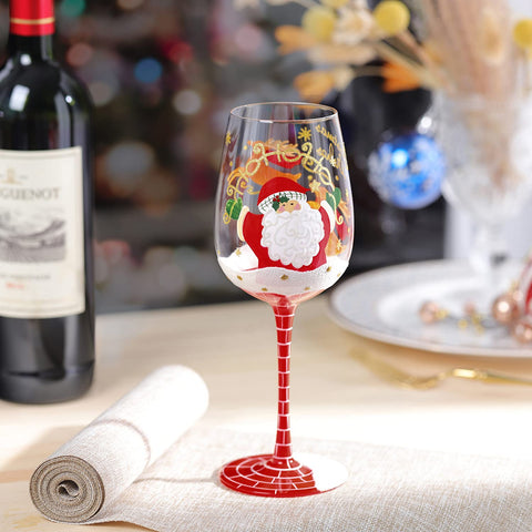 Vaso NymphFable con Papá Noel saliendo de la chimenea, ambiente navideño.