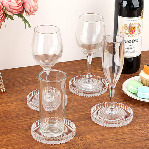 OGANAZI posavasos cristal con borde elevado, añade elegancia y protección.