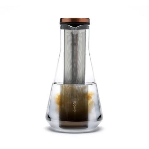 OHOM Sio Tapa cobre dorado con acabado premium.