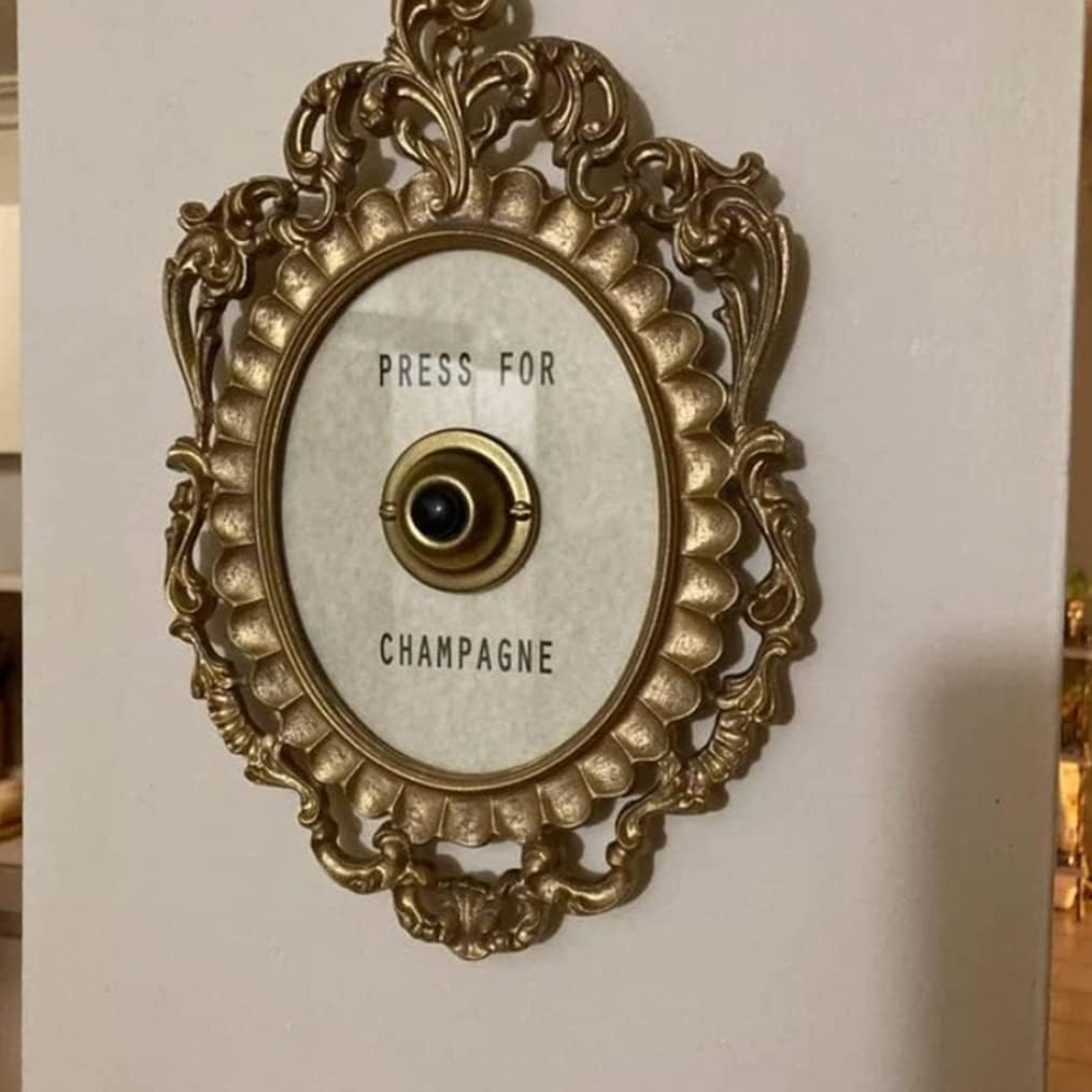 Campana de puerta Champagne de Okuorze para invitados