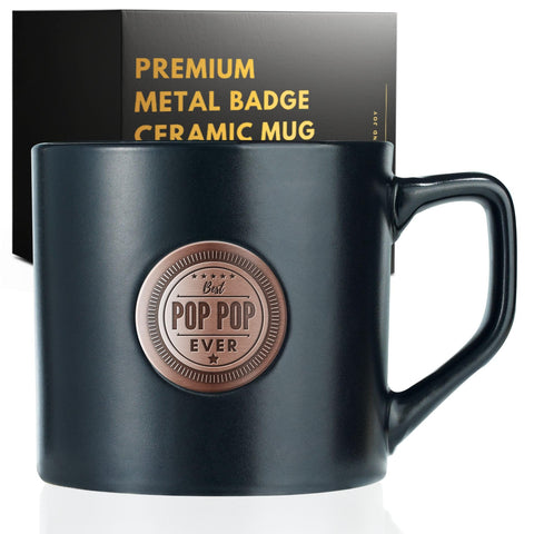 Taza Onebttl Pop Pop negra con insignia dorada, ideal para regalar.