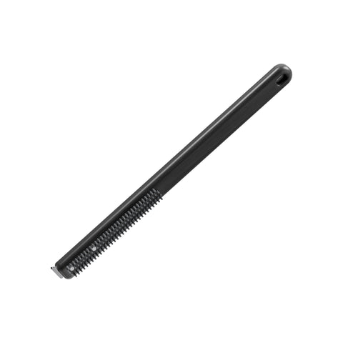 ooni raspador de acero en primer plano para quitar manchas adheridas