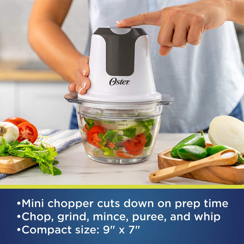 Oster Picadora mini con hojas de acero inoxidable para cortar frutos y verduras.