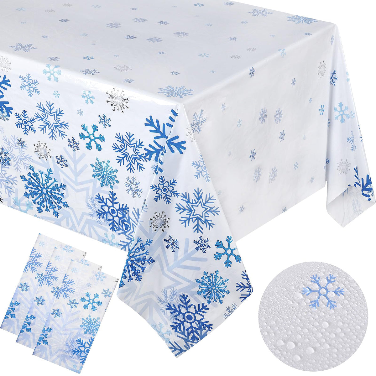 Mantel Oudain con copos de nieve azul y blanco para fiestas, crea ambiente festivo.