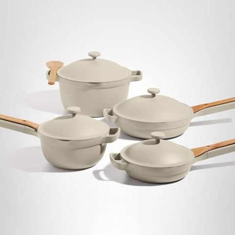 Conjunto de utensilios de haya incluido para cocción ordenada.