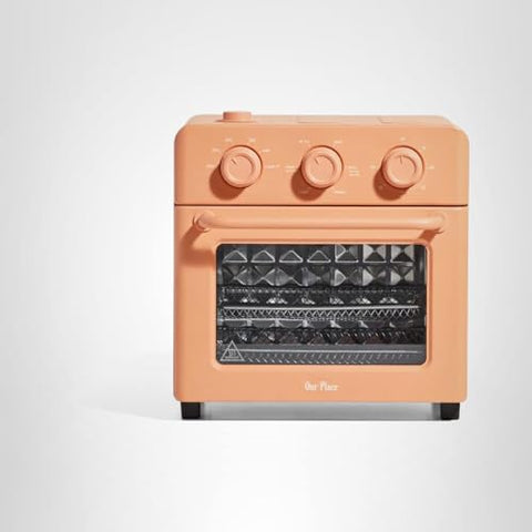 Our Place Wonder Oven acabado en acero inoxidable para cocina moderna.