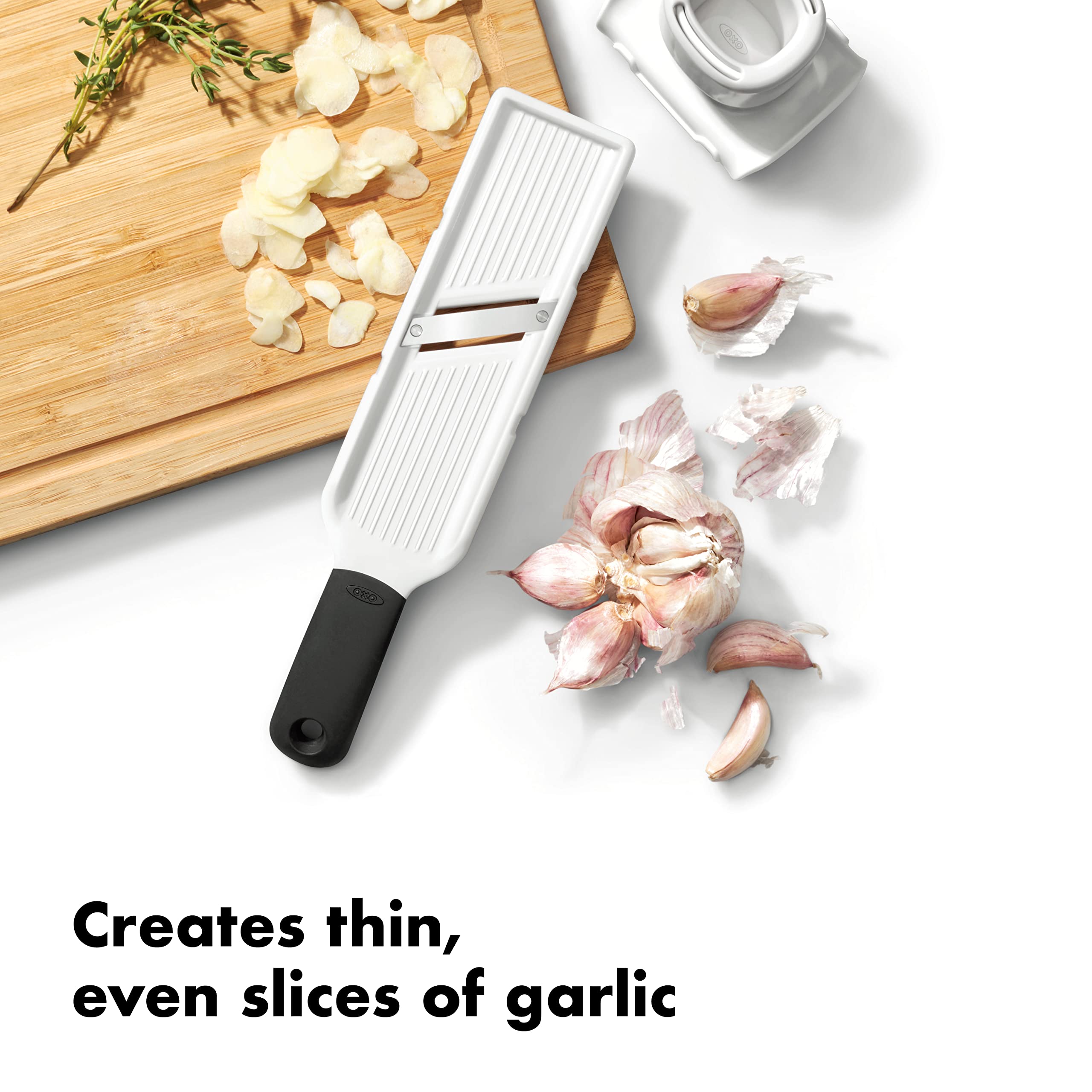 OXO Good Grips Garlic Slicer prensador de ajo mantiene el ajo en su lugar para cortes limpios