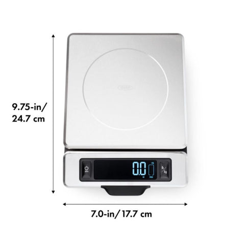 OXO Good Grips balanza negra compacta, ideal para cocinas con poco espacio.