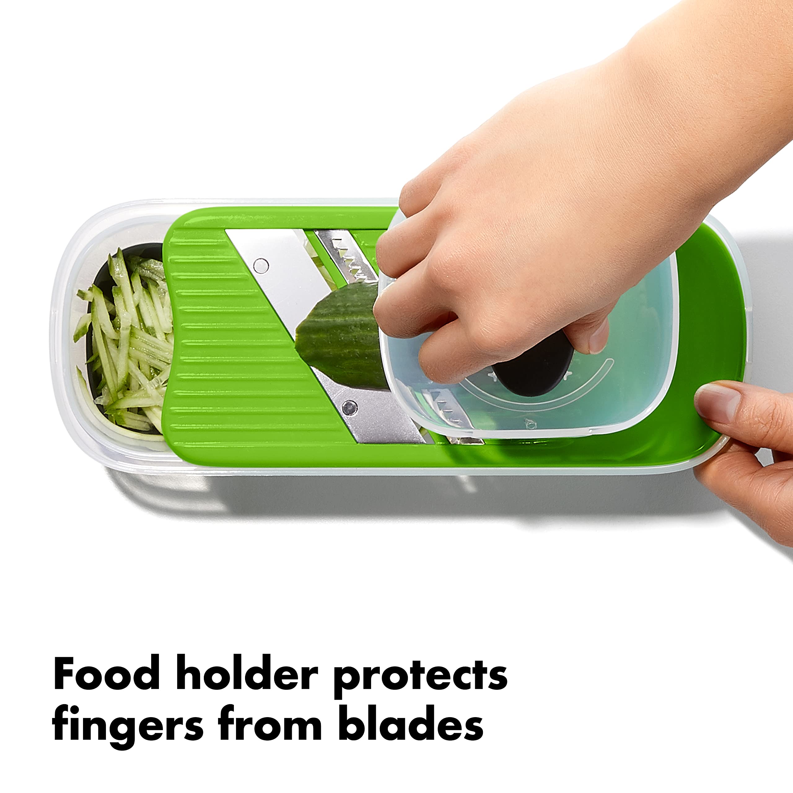 OXO soporte de alimentos; protege los dedos durante el corte.