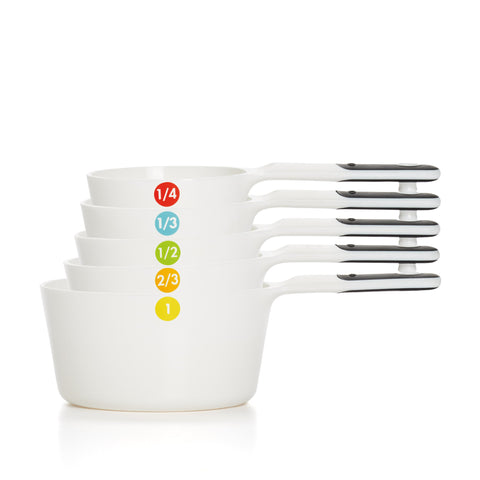 Tazas medidoras OXO Good Grips 1/4 taza; mango suave para medir con precisión.