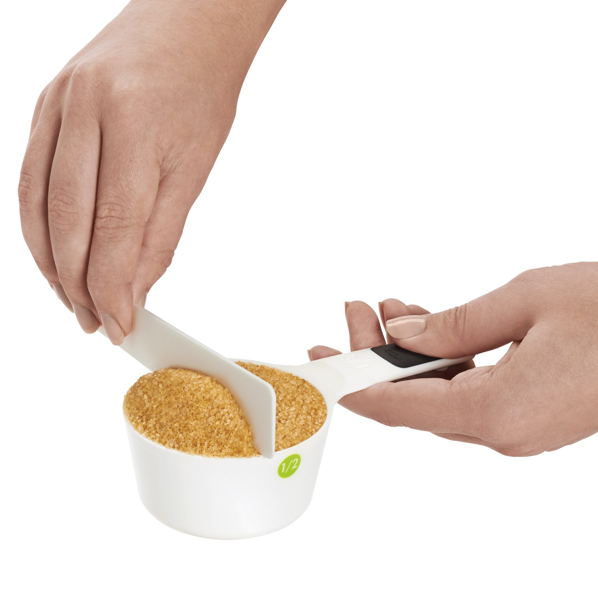 Tazas medidoras OXO Good Grips 2/3 taza; líneas internas para verificación rápida.