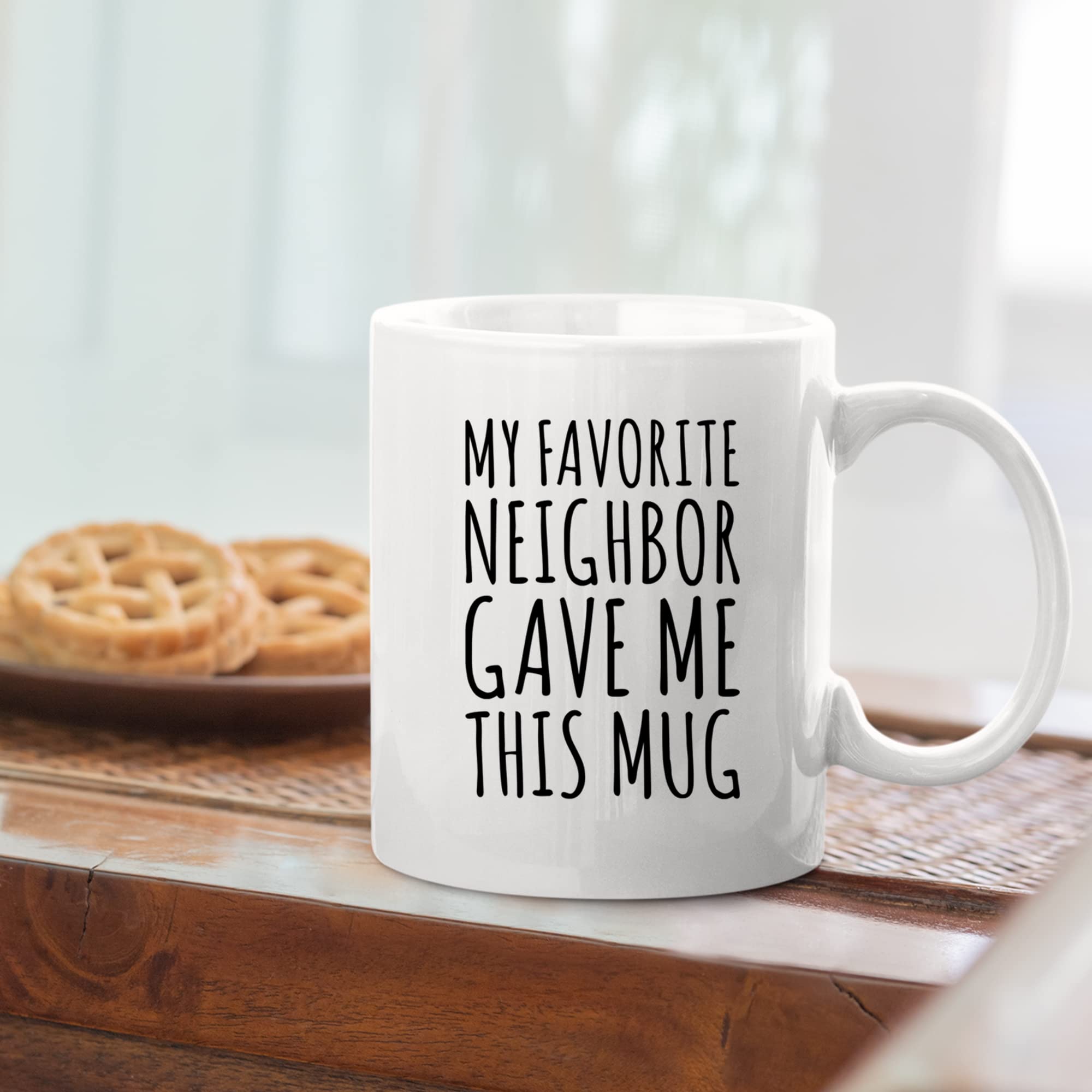 Taza Panvola con acabado brillante y detalle de impresión.