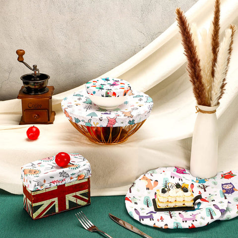 Patelai cubiertas reutilizables con estampados brillantes para cocinas.
