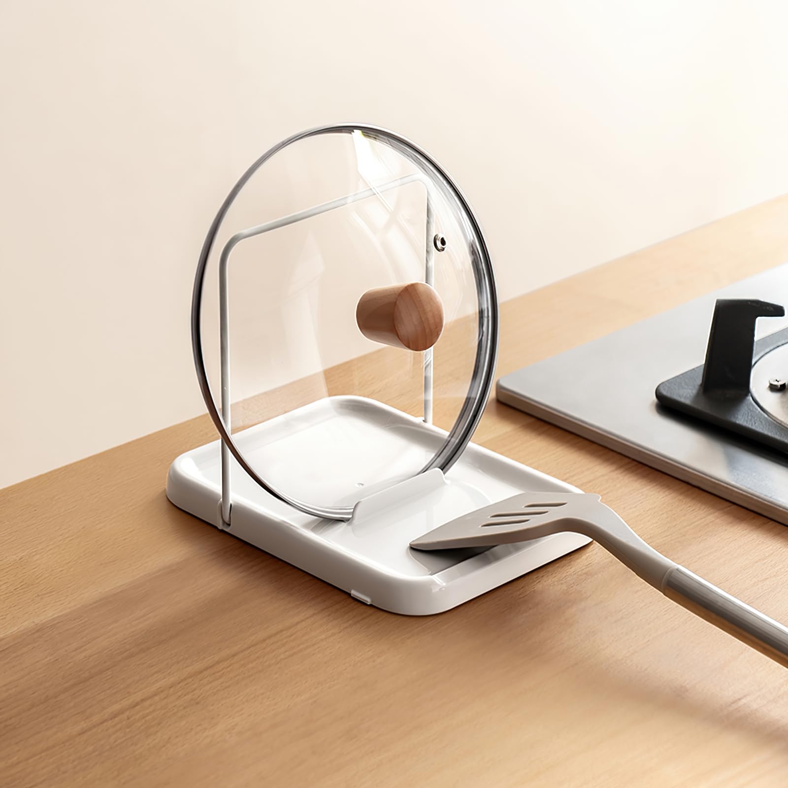 PAVSTINE: soporte para tapas de olla con base antideslizante y estable.