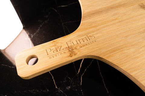 Paz Fumis presentación de pizza en plato de quesos con estilo.