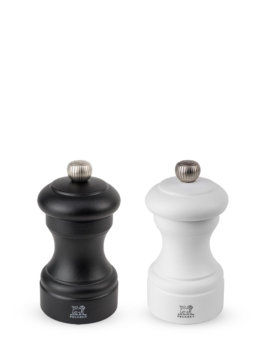 Molinillos Peugeot Bistro en negro y blanco para realzar sal y pimienta en la mesa