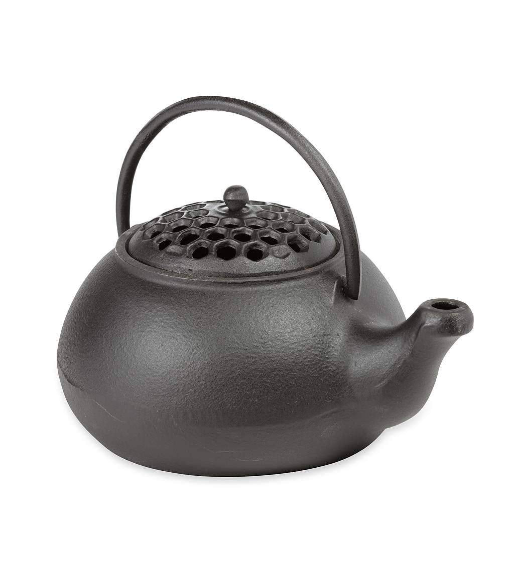 Hervidor de panales de madera de Plow & Hearth en estufa, humidifica suavemente el ambiente.