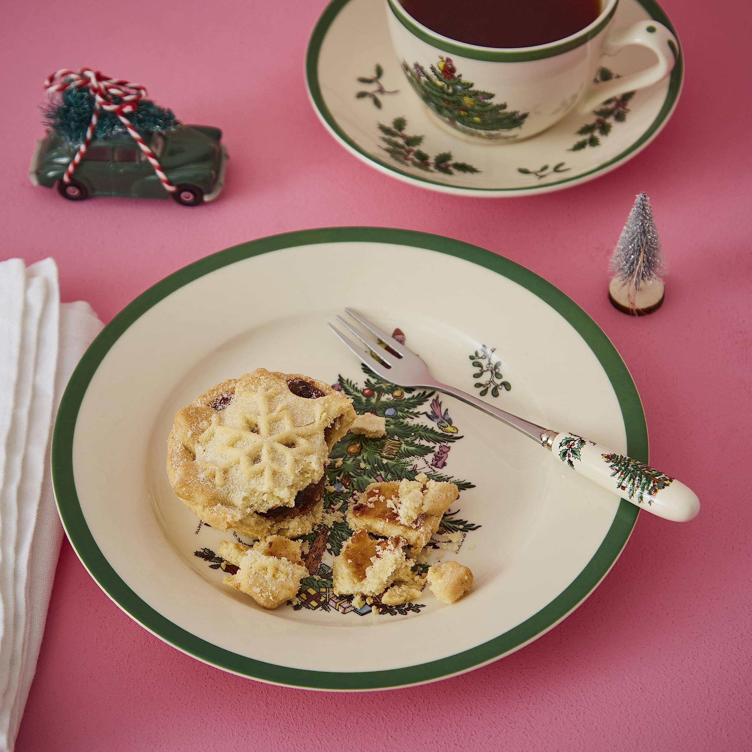 Cabeza de acero inoxidable y mango de porcelana de Portmeirion Spode para un toque elegante.